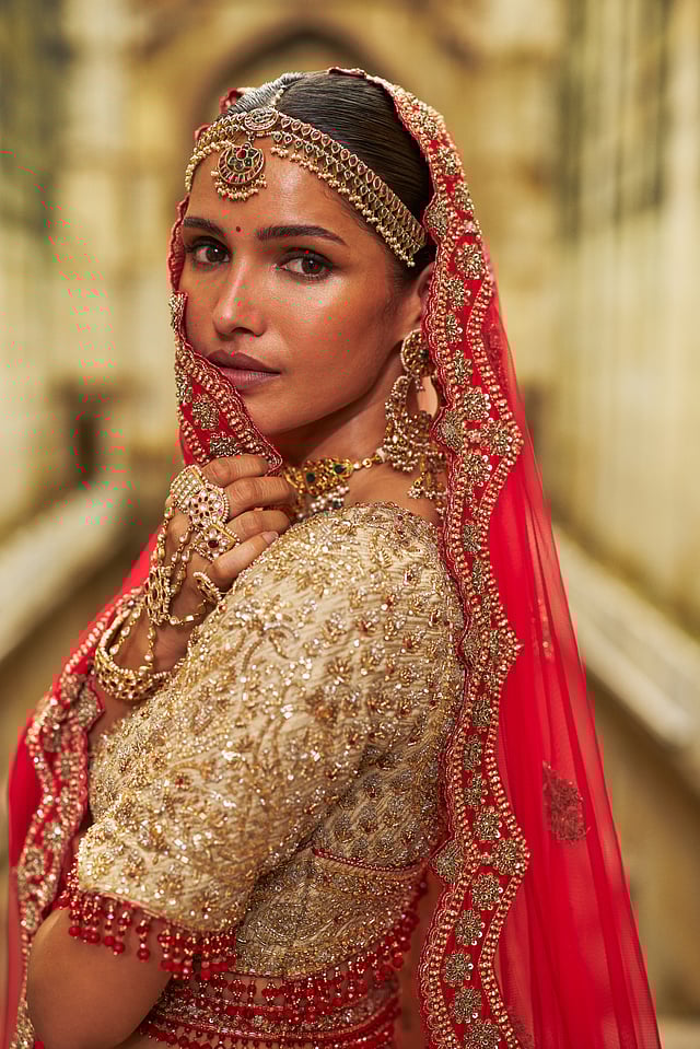 Materials like raw silk, tissue, tulle, and organza come together to craft the pieces