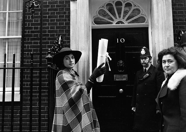 Actress Prunella Scales delivers a petition carrying the signatures of 100 prominent women to 10 Downing Street, London on February 11, 1975