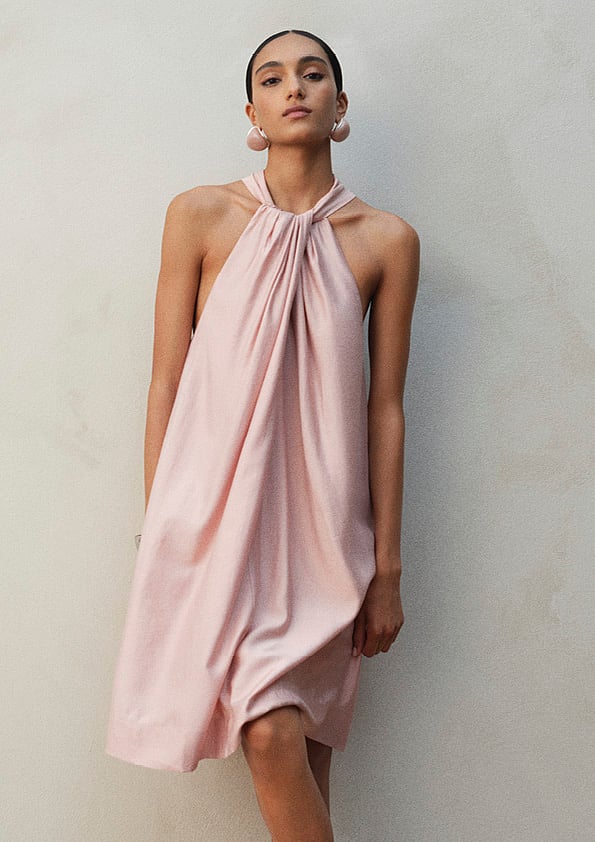 This beautiful pink dress from H&M can be worn at parties and lounge nights