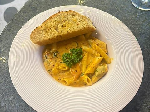 As evening settles in, the ambience shifts beautifully with warm lamps overhead