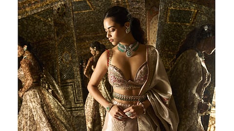 Symmetrical diamond and gemstone necklace inspired by reflection and balance