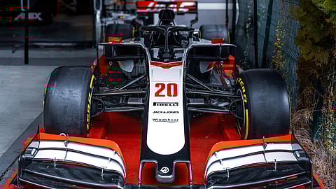 An F1 car is seen receiving traditional Indian aarti ahead of the race in a viral video