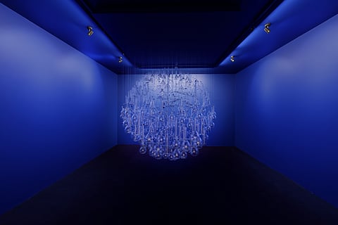 Sheba Chhachhi ‘Ajab Karkhana’ Installation with approximately 600 pieces of laboratory glassware, with audio and video components_72 × 72 × 72 inches