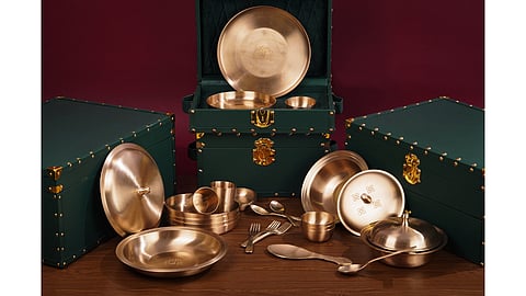 Detailed view of handcrafted kansa cutlery and serving pieces