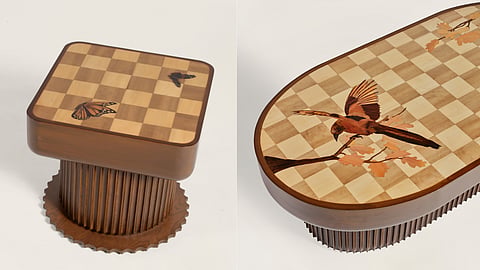 Detailed view of hand-cut wooden pieces forming marquetry pattern