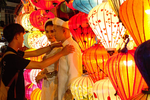 A Vietnamese bride and groom at Lantern Street, Old Market