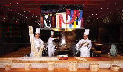 Chefs from The Venetian's North Restaurant making noodles