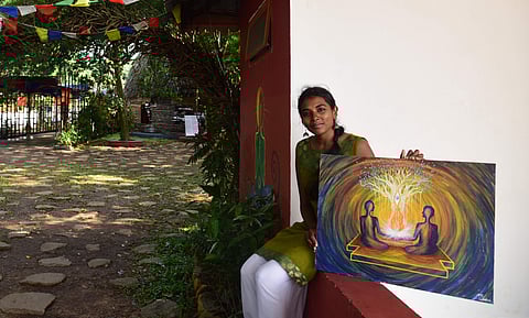 Lakshmi Tara with her painting