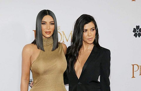 Kourtney and Kim Kardashian
