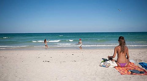 Buckle up: Soak up the sun in belted swimwear this summer