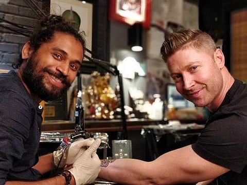 Vikas Malani and former Australian captain Michael Clarke