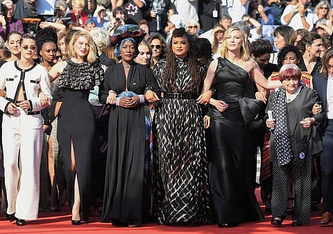 Women from the film industry walk a silent protest at Cannes 2018