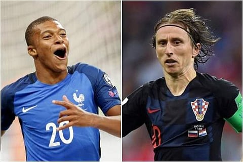 Kylian Mbappe of France and Luka Modric of Croatia