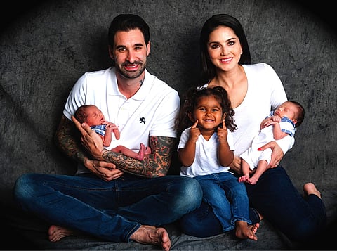 Sunny with husband Daniel and their children