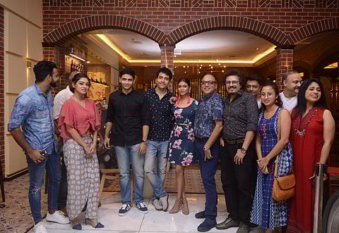 Cast and crew of Byomkesh Gotro celebrating Italian diner Serafina's fourth year in Kolkata