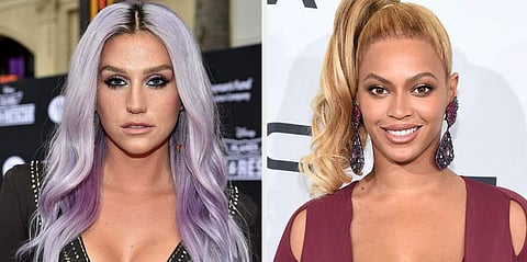 Singers Ke$ha and Beyonce Knowles