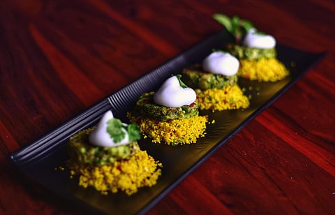 Grilled broccoli fritters with cous cous salad