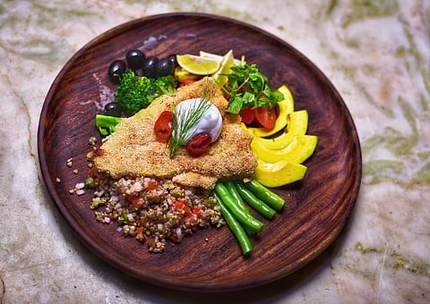 Semolina crusted fish with tossed broccoli