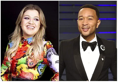 This combination photo shows singer and talk show host Kelly Clarkson and singer John Legend (AP Photo)
