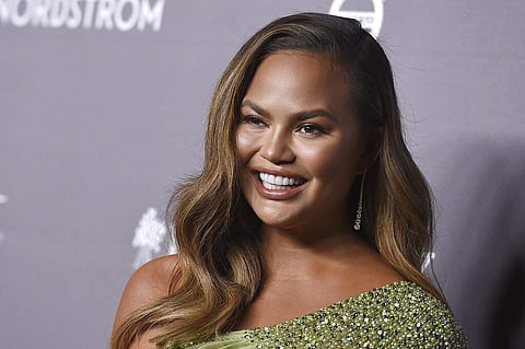 Chrissy Teigen arrives at the 2019 Baby2Baby Gala (Photo by Jordan Strauss/Invision/AP)