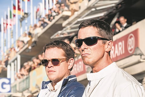 Damon and Bale in a still from Ford v Ferrari