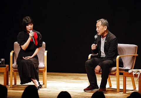Haruki Murakami and author Mieko Kawakami in Tokyo (Shinchosa via AP)