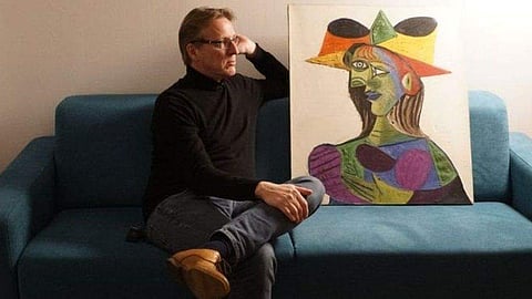 Arthur Brand with the recovered Picasso/Source: YouTube