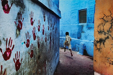 Steve McCurry, Boy in Mid-Flight (Photo Courtesy: Sotheby's)