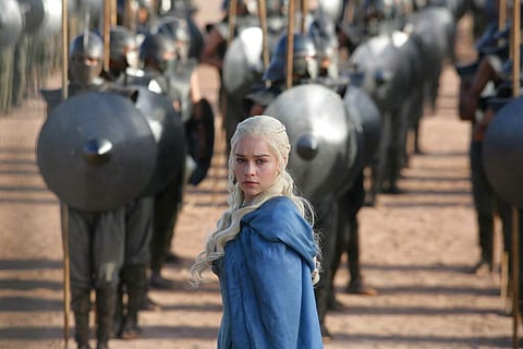 This image released by HBO shows Emilia Clarke in a scene from 'Game of Thrones.' The final season premieres on Sunday. (HBO via AP)
