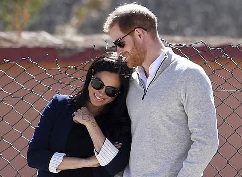 Prince Harry and Meghan (Photo: AP)