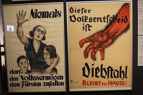 A historic posters displayed at the exhibition 'Weimar: The Essence And Value Of Democracy' at the German Historical Museum in Berlin, Germany. (AP Photo/Markus Schreiber)