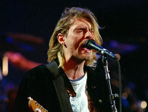 File photo, Kurt Cobain performs in Seattle in 1993 (AP Photo/Robert Sorbo, File)