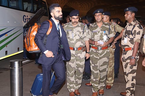 Virat Kohli carrying a Brune backpack
