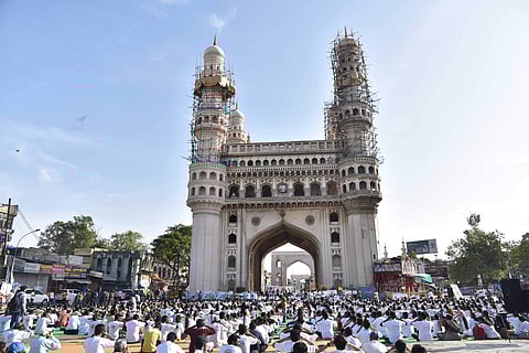Hyderabadis practise yoga in Charminar
