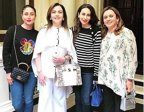 Nita Ambani with Karisma and Kareena Kapoor at Manchester's Old Trafford