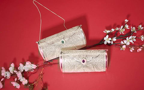 Clutches made with silver filigree work