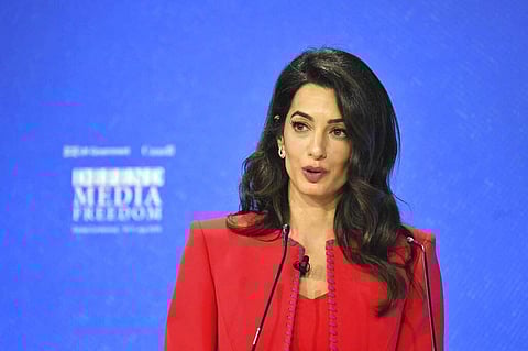 Amal Clooney speaks during the Global Conference for Media Freedom at The Printworks in London, Wednesday, July 10, 2019. (Dominic Lipinski/PA via AP)