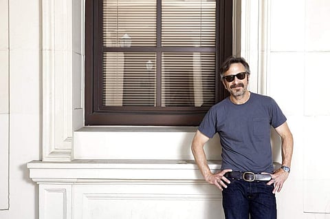 This June 11, 2019 photo shows actor, comedian and podcaster Marc Maron posing for a portrait in Los Angeles to promote his new indie comedy Sword of Trust. (Photo by Rebecca Cabage/Invision/AP)