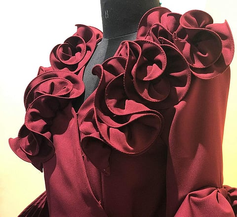 A ruffled wrap dress by NIVRITI