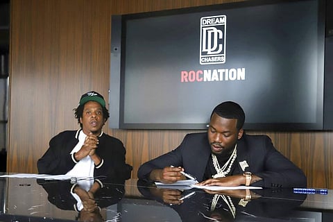 Jay-Z and Meek Mill (Photo by Greg Allen/Invision/AP)
