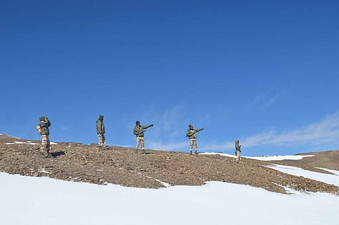Indo-Tibetan Border Police (ITBP) personnel on snow ridges of Himalayas. (Photo: IANS/ITBP)