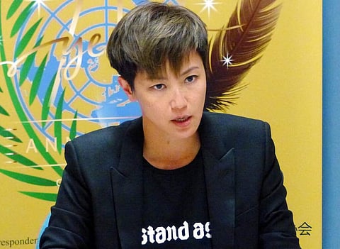 Hong Kong pop singer Denise Ho at the UN building in Geneva, Switzerland. (AP Photo/Jamey Keaton)