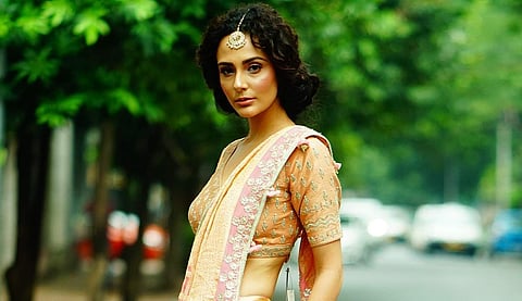 Handwoven in a contemporary Banarasi weave, the peachy naima sari is a contemporary classic