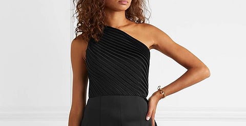 Ruffles, pleats, lace and frills take on modern avatars in the collections of Prada, Alexander Wang and others