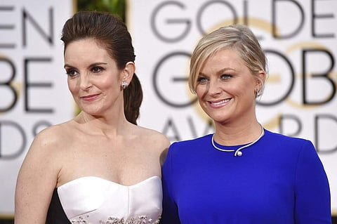 Tina Fey and Amy Poehler (Photo by John Shearer/Invision/AP)