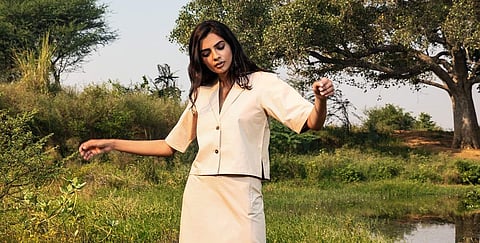 A beige collared lapel top in beige by Khara Kapas