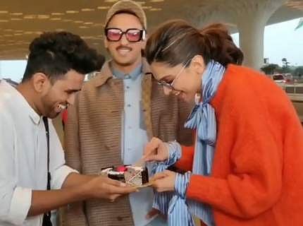 Deepika Padukone cuts her 34th birthday cake at the airport with Ranveer Singh