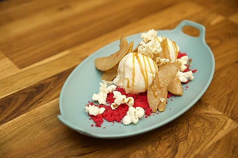 Five spiced pears with vanilla ice cream