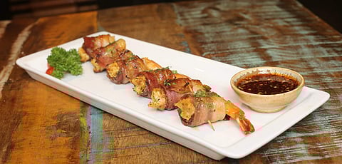 Bacon wrapped prawns at Burnt Garlic