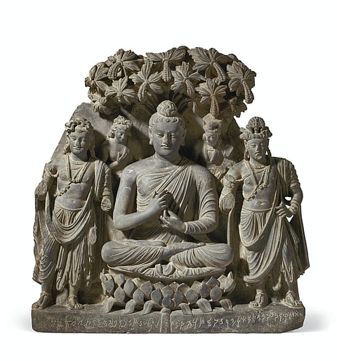 The gray schist triad of Buddha Shakyamuni that sold for $6,630,000. Picture courtesy: christies.com